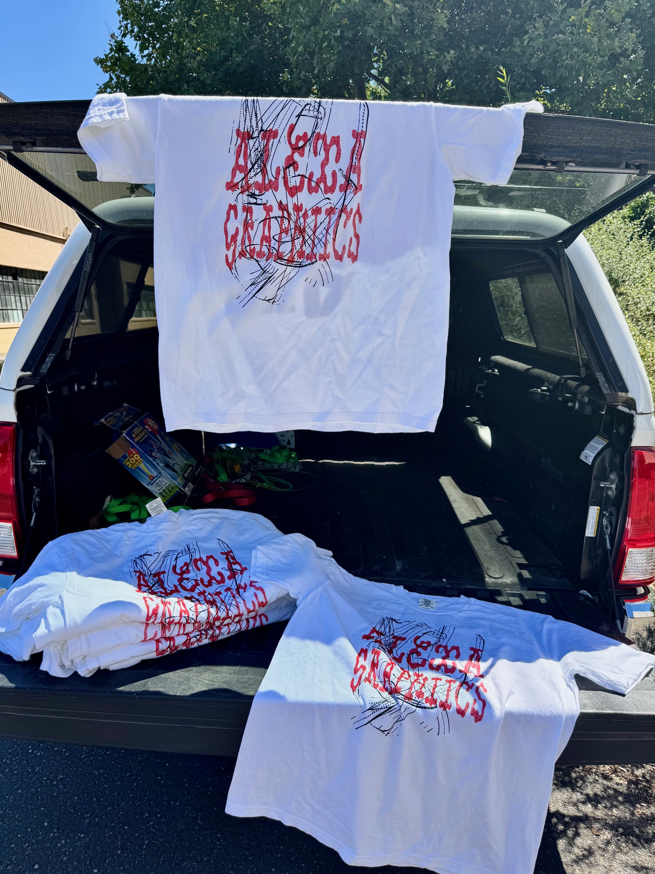Alexa Graphic's "Freeway T-shirt in the back of their truck"